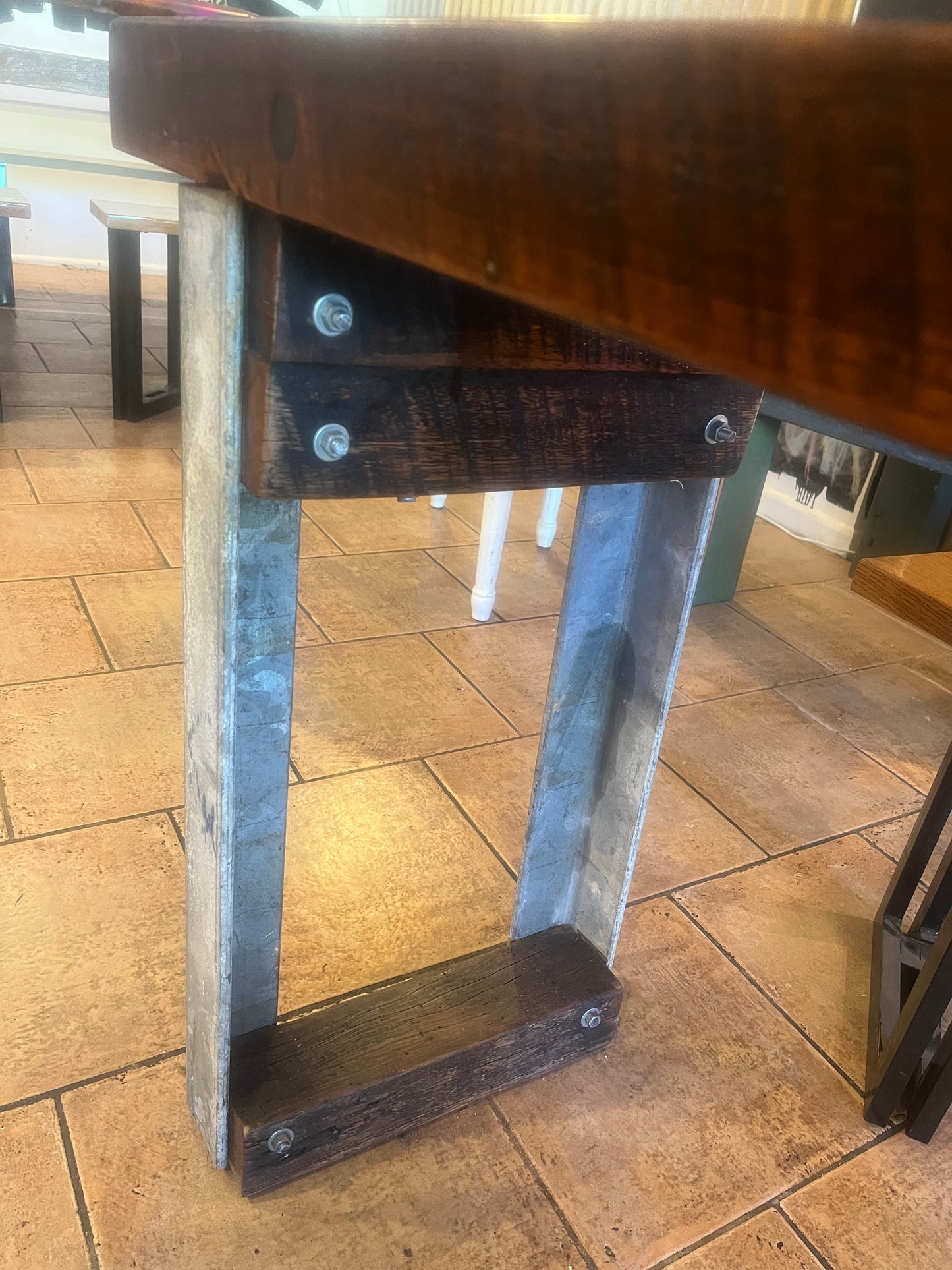 Warehouse reclaimed hardwood and steel table